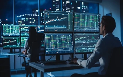 Team analyzing real-time data on a large digital